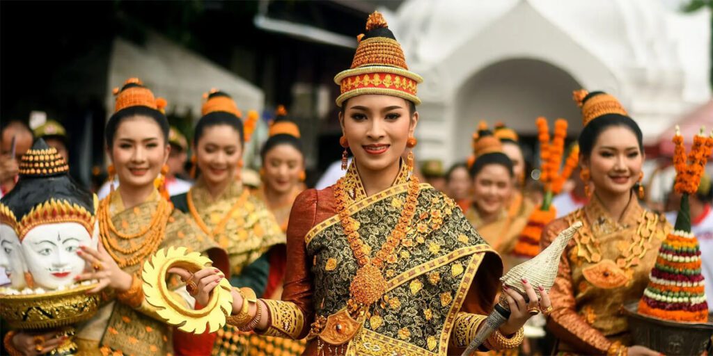 Pi Mai Festival in Laos: Participants celebrate with water fights, traditional ceremonies, and festive parades.